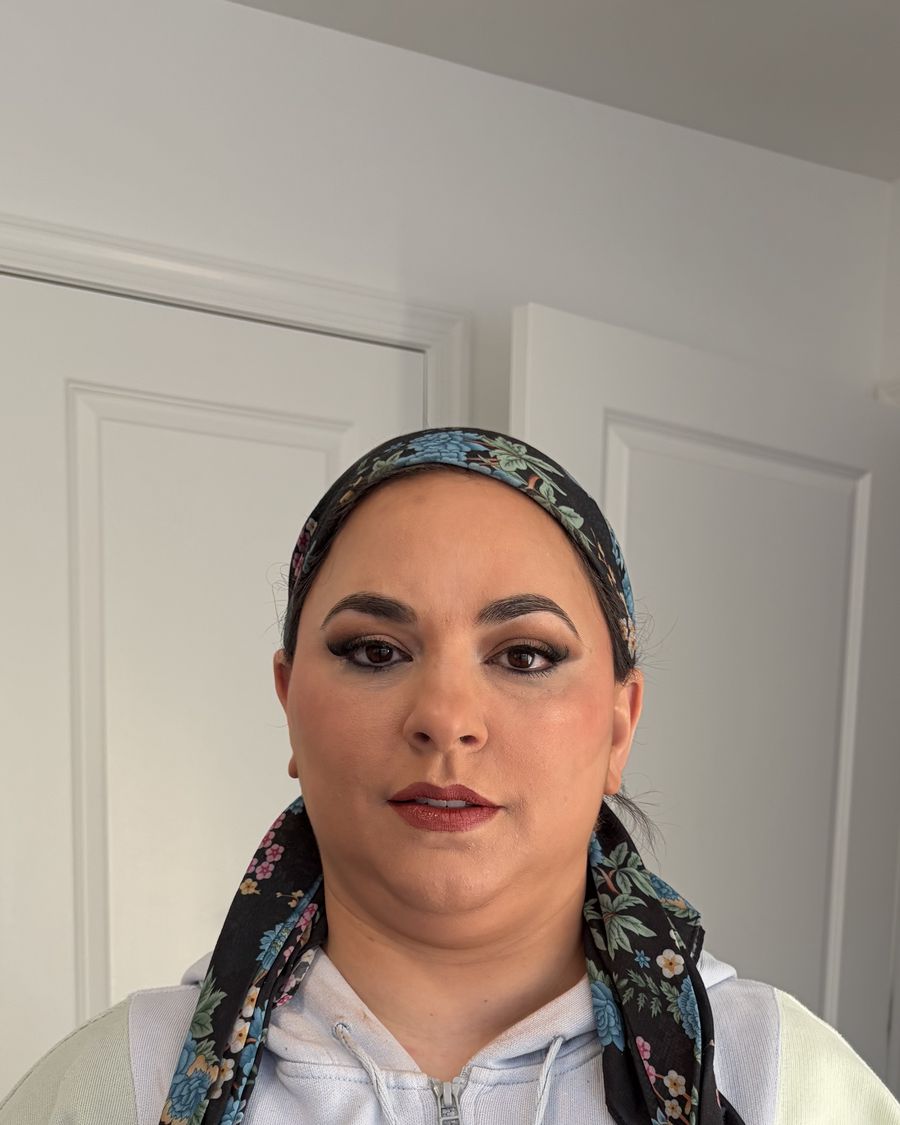Evening makeup worn with a patterned tichel